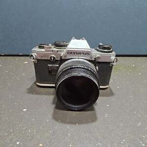 Vintage Olympus OM-10 35mm Film SLR Camera w/ Zuiko 50mm f/1.8 Lens
